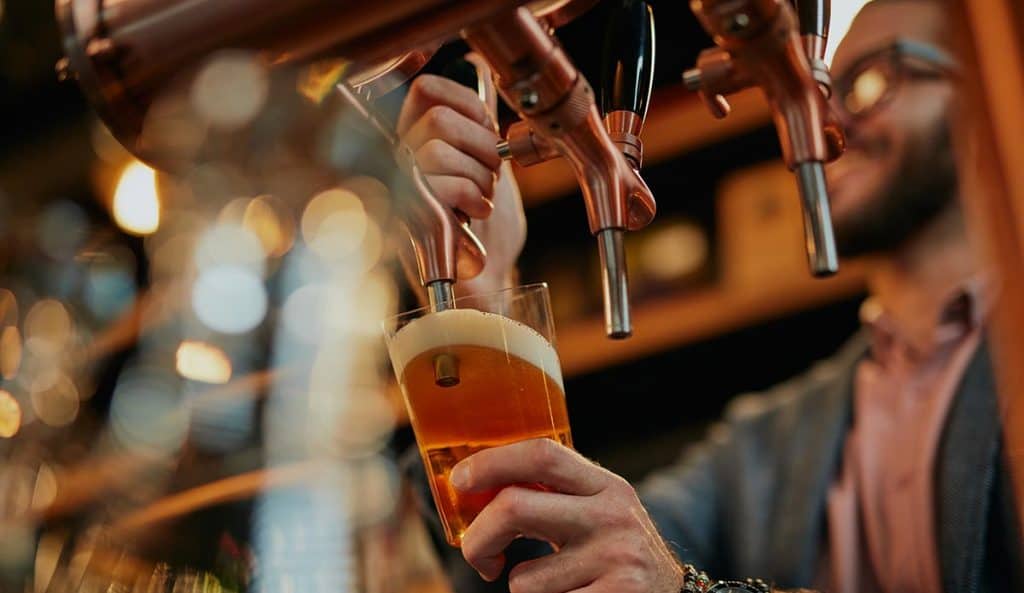 Pouring pint of beer