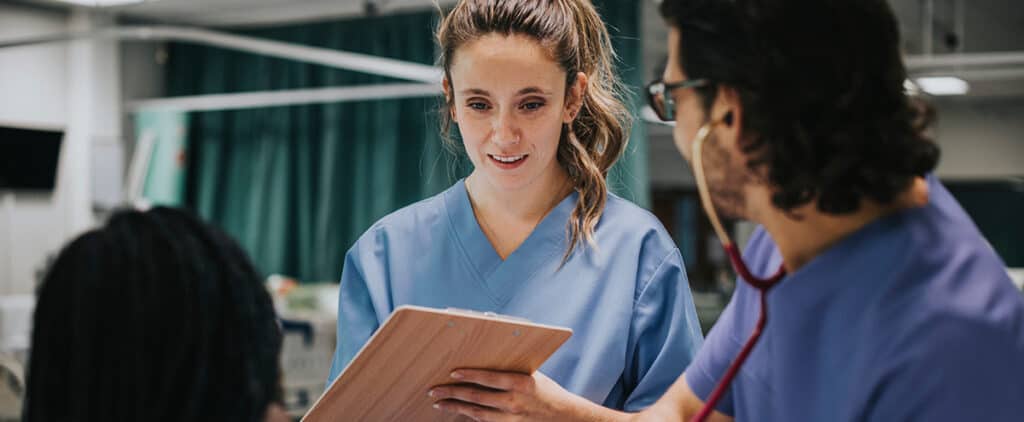 Young male physician examining a patient